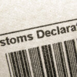 fragment of customs declaration document with bar-code